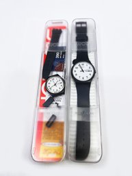 (J-10) TWO VINTAGE SWATCH WATCHES IN CASES - NOT TESTED