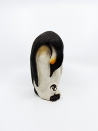 (UB-59) SIGNED AND HAND PAINTED PENGUIN AND CHICK - 'SANDRA BRUSH?' - SMALL PAINT CHIP- APPROX. 8 1/2' TALL