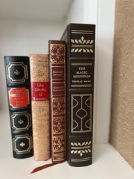 (UPLIB) COLLECTION OF FOUR LEATHER BOUND HARDCOVER BOOKS - MADAM BOVARY, EMERSON