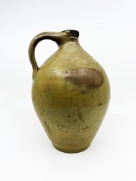 (BAS-19) ANTIQUE STONEWARE JUG WITH CURVED HANDLE-APPROX. 9 1/2' X 6'