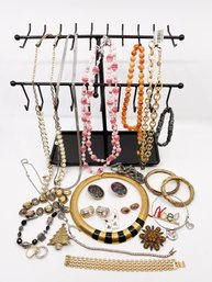 (J-2) VINTAGE LOT OF APPROX. 25 PIECES OF COSTUME JEWELRY-NECKLACES, BRACELETS, RINGS AND EARRINGS