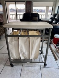 LIKE NEW, ROLLING CANVAS LAUNDRY SORTER / HAMPER - 31' BY 36'