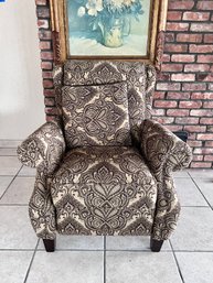 BROWN PAISLEY UPHOLSTERED RECLINING ARMCHAIR - 41'H BY 37'W BY 40'D