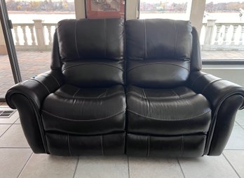 LIKE NEW, DARK BROWN LEATHER SOFA WITH TWO RECLINING SEATS - ELECTRIC - 67'W BY 42'H BY 21'D