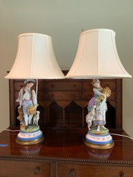 ANTIQUE PAIR OF FIGURAL PORCELAIN TABLE LAMPS - ONE CHIP TO HER BUNCH OF WHEAT- 28' TALL W/SHADE, 6' WIDE BASE