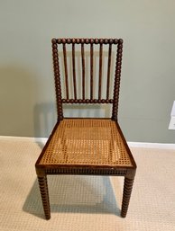 ANTIQUE CANE BACK CHAIR WITH BARLEY TWIST LEGS - 18' BY 34' HIGH