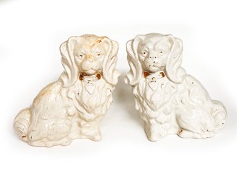 (B-100) PAIR OF ANTIQUE STAFFORDSHIRE DOGS -WHITE/BEIGE CERAMIC GLAZED -BOTH HAVE CHIPS & CRACKS