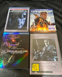 (M-31) FOUR DVD'S TERMINATOR MOVIES ALL SEALED EXCEPT #3' - SEALED