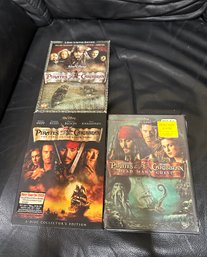 (M-32) THREE DVD'S PIRATES OF THE CARIBBEAN MOVIES  - 2 SEALED, 1 OPEN