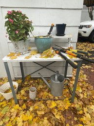 (Gar) STEEL LEG PLANTING / POTTING TABLE WITH ASSORTED TOOLS, PLANTERS & WATERING CAN AS SHOWN
