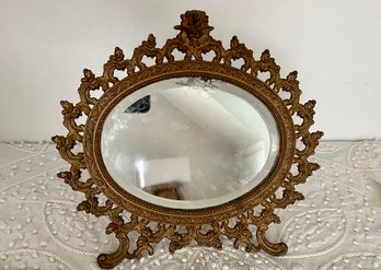 (U-22) ANTIQUE BRASS TABLETOP VANITY MIRROR WITH STAND & BEVELED GLASS - 11' BY 10' - DAMAGE TO TOP OF MIRROR