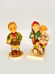 (A-14) VINTAGE LOT OF 2 HUMMEL FIGURINES-'tRUMPET BOY' AND 'SOLDATENSPIEL VOLUNTEERS'-WEST GERMANY