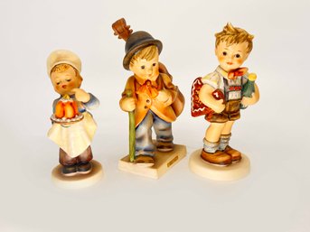 (A-16) VINTAGE LOT OF 3 HUMMEL FIGURINES-#128 'bAKER' '89 'LITTLE CELLIST'#399 'VALENTINE JOY'-WEST GERMANY