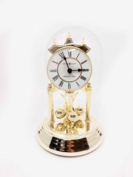 (A-26) VINTAGE HOWARD MILLER WESTMINSTER CHIME ANNIVERSARY TABLE CLOCK - QUARTZ MOVEMENT- W/DOME- MODEL645-342