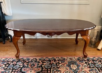 (LR) TRADITIONAL CHERRY WOOD OVAL COFFEE TABLE - 45' BY 27' BY 17' HIGH