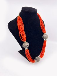 (J-6) VINTAGE MULTI-STRAND CORAL BEADED NECKLACE W/LARGE SILVER TONE DECORATIVE BEADS