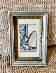 ANTIQUE FRAMED ENGRAVING DEPICTING A WOMAN PLAYING THE HARP- HAND COLORED, 7' BY 10'