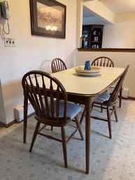 FORMICA TOP KITCHEN TABLE WITH ONE LEAF & FOUR CHAIRS - 66' BY 35' WIDE WITH 17.5' LEAF