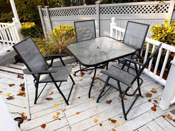 (C-48) PREOWNED 5 OUTDOOR FURNITURE PIECES-1 SQUARE TABLE AND 4 FOLDING MATCHING CHAIRS-AS IS