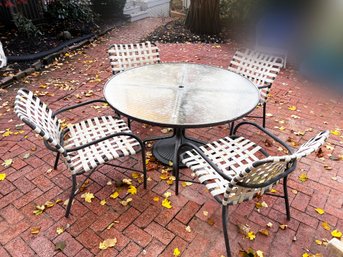 (C-50) PREOWNED 5 PIECE OUTDOOR MATCHING PATIO PIECES-1 ROUND GLASS TOP TABLE AND 4 CHAIRS-AS IS