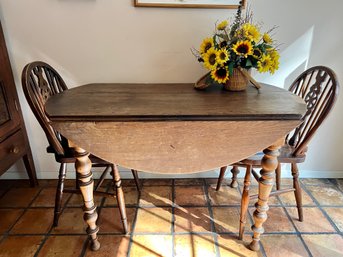 (K) CHARMING PRIMITIVE DROP LEAF DINING TABLE - 50' BY 44' BY 30' HIGH & TWO VINTAGE CHAIRS