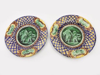 (A-122) PAIR OF ANTIQUE ENGLISH MAJOLICA PLATES WITH CHERUB PUTTI DECORATION, 19th Cen.- SEE ROUGH  EDGE ON 1