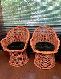 (B) PAIR OF WICKER RATTAN BUCKET PEACOCK ARMCHAIRS WITH RED SEAT CUSHIONS - 38' BY 26' BY 20', SEAT IS 19'