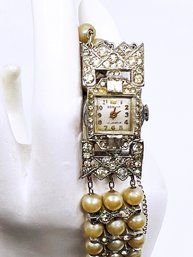 (J-13) VINTAGE LADIES 'GENEVA' MANUEL WRISTWATCH-17 JEWELS-RHINESTONES AND FAUX PEARLS-WORKS