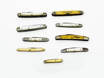 (J-20) LOT OF 9 VINTAGE POCKET KNIVES W/PEARL AND YELLOW TONE HANDLES-AS IS