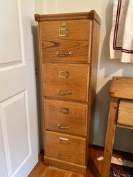 (BR) TALL VINTAGE OAK FOUR DRAWER FILE CABINET - 52' H BY 17' D BY 16'