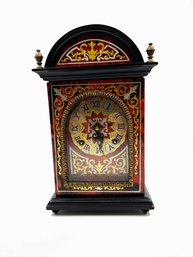 (A-4) VINTAGE 'URGOS' WOOD AND BRONZE CLOCK W/KEY AS IS-APPROX. 10' X 4' X 5'
