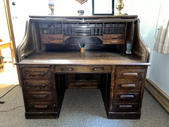 (B) A GENUINE ENGLISH ANTIQUE ROLL TOP DESK BY WILLIAM ANGUS & CO. LONDON - 50' W BY 60' H BY 34' DEEP