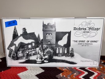 (Z-9) DEPT. 56 DICKENS' VILLAGE SERIES 'SPIRIT OF GIVING' SET OF 13 WITH TWO HOUSES- NEW IN BOX