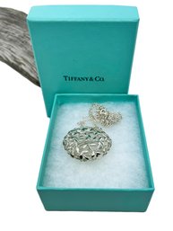 (J-2) TIFFANY & CO. STERLING SILVER PALOMA PICASSO PUFFED 'OLIVE LEAF' MEDALLION PENDANT ON 30' NECKLACE W/BOX