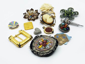 (J-34) LOT OF 13 COSTUME JEWELRY ITEMS-PINS, BELT BUCKLE AND PENDENTS