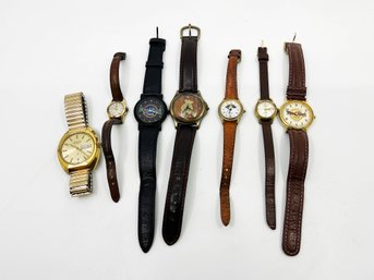 (J-30) LOT OF 7 VINTAGE WRISTWATCHES-ALL AS IS-GUND,HARD ROCK CAFE ETC