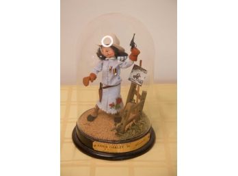 A-6 ANNA LEE ANNIE OAKLEY 1985 WITH GLASS DOME AND WOODEN BASE