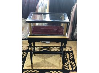 C-10- VINTAGE GLASS DISPLAY TABLE- BLACK AND GOLD- 28' HIGH BY18' WIDE BY 12' DEEP