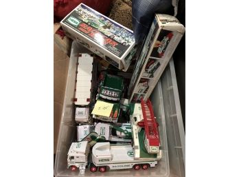 E-25 -BIG LOT OF ASSORTED VINTAGE HESS TRUCKS - SOME BOXED -APPROX 20