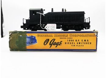 (122) VINTAGE TRAIN-MFG.GENERAL MOTORS CORP-O GAUGE-TIN PLATE DIESEL SWITCHER