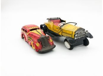 (5) LOT OF 2 VINTAGE TIN TOYS-1-MARX TRICKY TAXI AND 1 YELLOW JALOPY MADE IN JAPAN