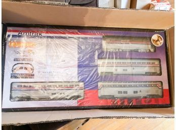 (79) RAIL KING-AMTRACK GENISIS ELECTRIC TRAIN SET-0 GAUGE-NEW IN BOX NEVER OPENED