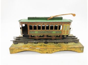 (161) VINTAGE 1920'S CHEIN LITHOGRAPHED TIN TROLLEY W/TIN BASE AND TRACK BY MECCANO LTD.ENGLAND