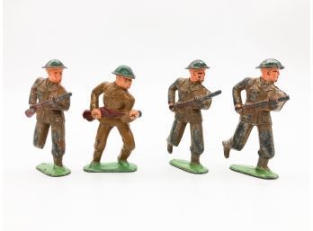 (63) LOT OF 4 VINTAGE METAL SOLDIERS-MADE IN BRITAIN-HAND PAINTED-1 MISSING FOOT