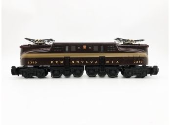 (141) VINTAGE POSTWAR LIONEL LOCOMOTIVE-PENNSYLVANIA #2340-MAROON WITH 5 STRIPES-BOX