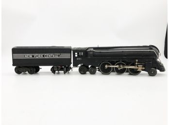 (137) VINTAGE POSTWAR LIONEL-#221 NY CENTRAL ENGINE AND WHISTLE TENDER BLACK