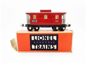 (90) VINTAGE PREWAR LIONEL TRAIN-#657-0 GAUGE-RED CABOOSE-IN ORIG. BOX