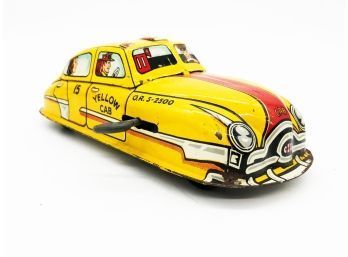 (28) VINTAGE MARX TIN WINDUP TOY-YELLOW CAB-WORKS