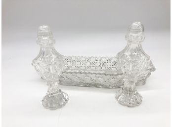 (56) LOT OF 3 CUT GLASS PIECES-1 GLASS CUT TRAY AND 1 SET SALT AND PEPPER SHAKER