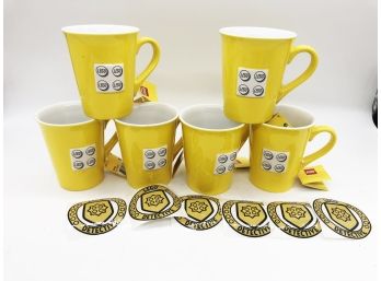 (108) LOT OF 6 'LEGO' MUGS - YELLOW WITH LEGO LOGO & 6 LEGO DETECTIVE STICKERS - NEVER USED